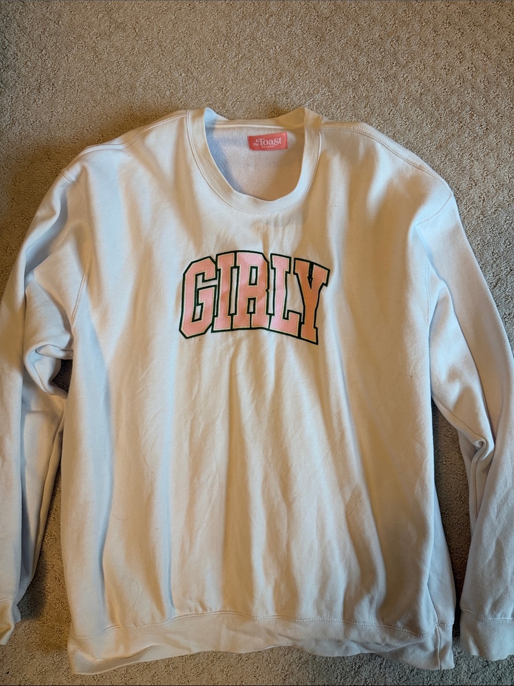 The Toast Podcast 'GIRLY' White Crewneck Sweatshirt with Pink Lettering